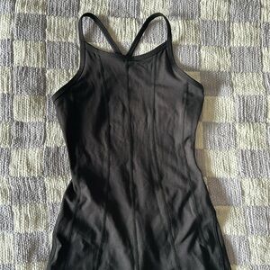Free People Movement XS Black Onesie Open Crossback NWOT Never Been Worn